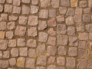 Old paving stones closeup, background, texture.