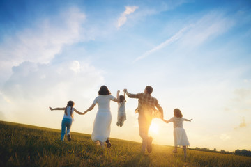 Happy family on summer walk