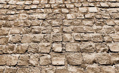 Old paving stones in perspective closeup, background, texture.