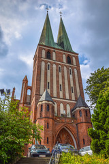 Fototapeta premium Evangelical Garrison Church, currently Roman Catholic Parish of the Holy Virgin Mary The Queen of Poland and Holy Archangels in Olsztyn, Warmian-Masurian Voivodeship, Poland.