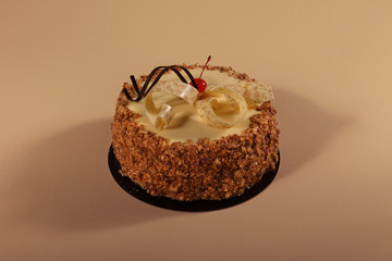 Beautiful Cake with white chocolate and nuts