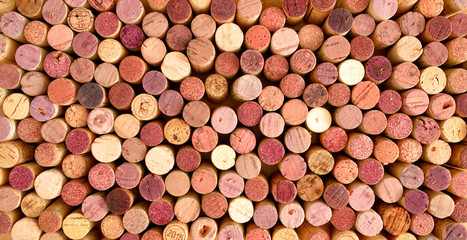 Very high resolution photo of a large number of  used corks of red wines bottles. 