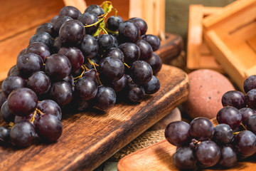  freshly cut fresh grapes in a rustic setting