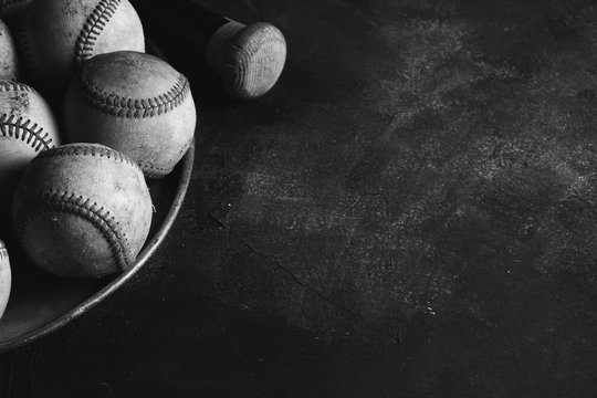 Old baseballs on grunge background with copy space for sport or game text.