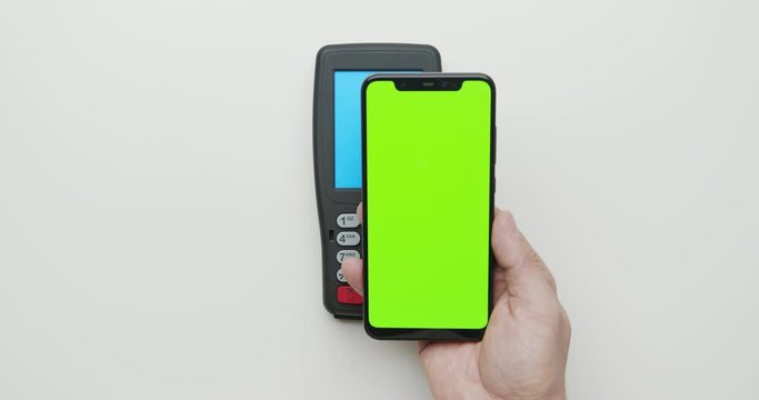 Contactless payment for paying by smartphone with nfc technology. Terminal and phone with template screen