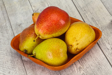 Pear heap in the wooden basket