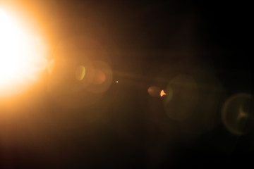 Flash of a distant abstract star. Abstract sun flare. The lens flare is subject to digital...