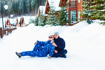 Young happy smiling couple in love. Winter