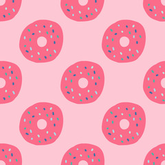 Pink doughnuts seamless repeat pattern for wrapping paper.