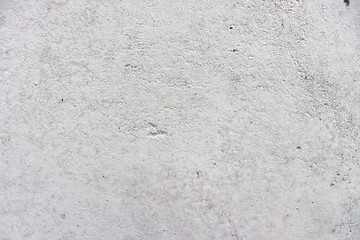 Background of white concrete wall. Uneven concrete wall.