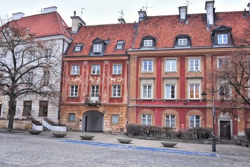 Fototapeta premium Warsaw, Poland - January 2020. Old town streets in Warsaw. Beautiful building in the center in Warsaw. The medieval streets of the historic heritage of Poland. The main tourist attraction of Warsaw. 