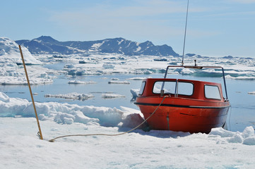 Boat and floating ice in greenland