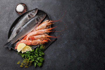 Fresh seafood. Trout fish and langostino shrimps