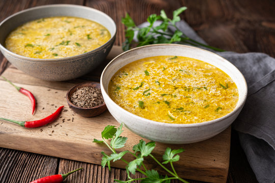 Quick and simple spicy egg drop soup with parsley and chilli