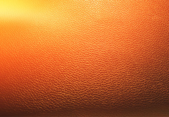 Orange sunny leather texture background