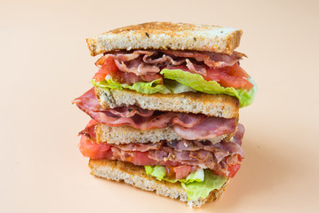 A BLT is a type of sandwich, named for the initials of its primary ingredients, bacon, lettuce and tomato