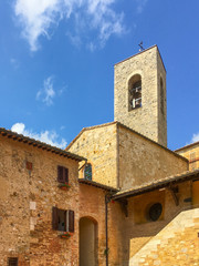 Fototapeta na wymiar Medieval bell tower in San Gimignano, Italy.