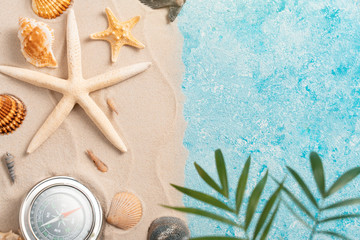 Flat lay top view copy space Minimal exotic concept. Creative layout of sand waves and sea summer beach background with shell sea star compas blurred Palm vacation and travel concept © velishchuk