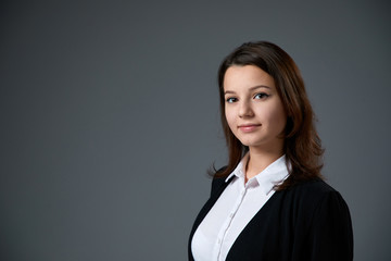 Business woman portrait in studio.