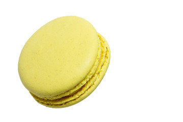 Tasty yellow macarons  isolated on white background.