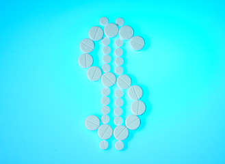 Dollar sign made of round white pills on blue background. Pharmacy business, medicine pill concept. pharmaceutical business
