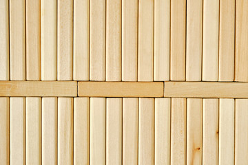 Background of wooden tightly folded rectangular bricks.