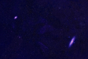 Beautiful space, two galaxies among the stars. Elements of this image were furnished by NASA.