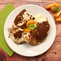 Sweet, homemade tiramisu biscuit with mascarpone cream, espresso, lemons and cocoa.