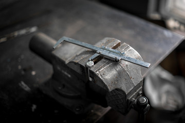 Caliper on the desktop prepared for work. Production.