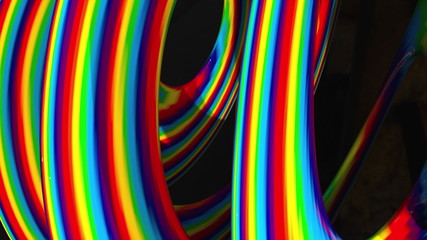 Colored twisted shape. Computer generated abstract hypnotic background. 3D render swirling lines