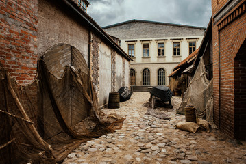 Old vintage fisherman's village with fishing nets