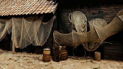 Old vintage fisherman's village with fishing nets