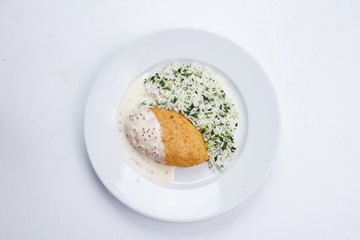 cutlet with rice and cream sauce