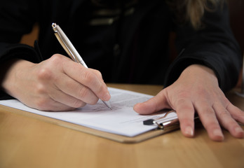 Sign a business contract. Close up. Lifestyle