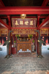 Fototapeta na wymiar Interior altar of the Temple of Literature in Hanoi, Vietnam, featuring Chinese philosopher Confucius.