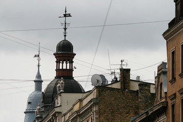 Riga, May, 2008, Old brick houses with towers and many TV antenas on the roof