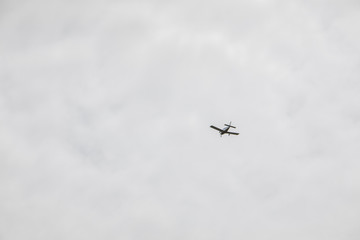 small airplane in sky