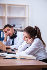 Call center operators working in the office