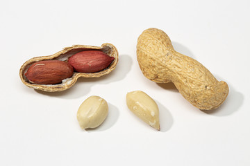 Dried peanuts isolated on white background. Arachis hypogaea