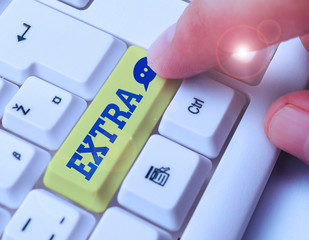 Text sign showing Extra. Business photo text Added to existing or usual amount number In addition...