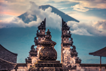 Fototapeta na wymiar Bali traditional architecture background with temple Lempuyang with view on Agung volcano mount during sunset
