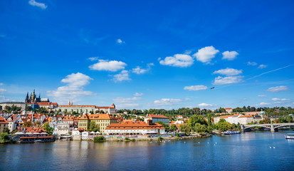 Naklejka na ściany i meble View of the city and the Vltava River in Prague, the capital of the Czech Republic.