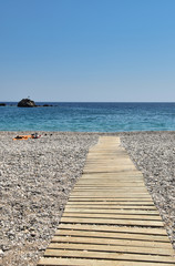 Fototapeta na wymiar Grecia passerella per il mare