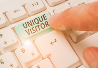 Writing note showing Unique Visitor. Business concept for Individuals who have visited a Web site...
