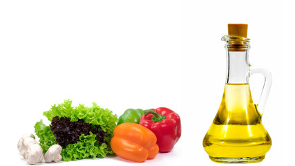 Lettuce, bell pepper and mushrooms and oil on a white background