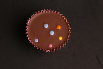 Chocolate cupcake with pink paper