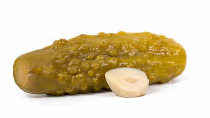 pickled cucumbers with garlic on a white background