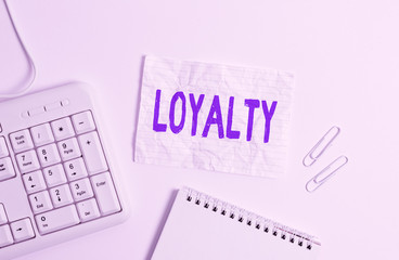Handwriting text Loyalty. Conceptual photo faithfulness to commitments or obligations Quality of staying firm White pc keyboard with empty note paper above white background