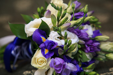 Bouquet of flowers. Violet, green, white.