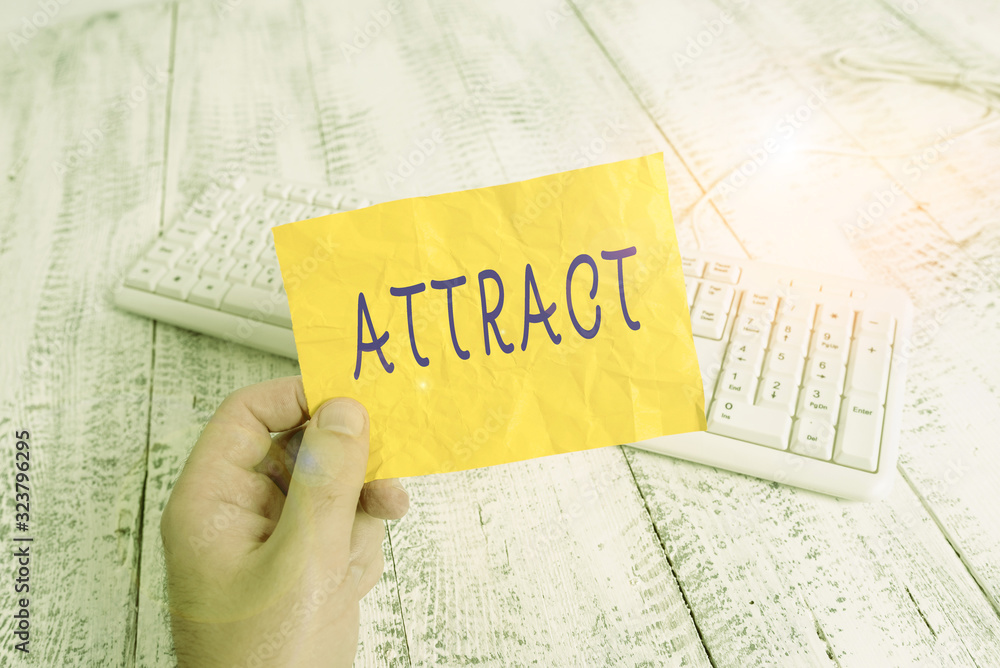 Poster text sign showing attract. business photo showcasing to draw by a physical force causing or tending 